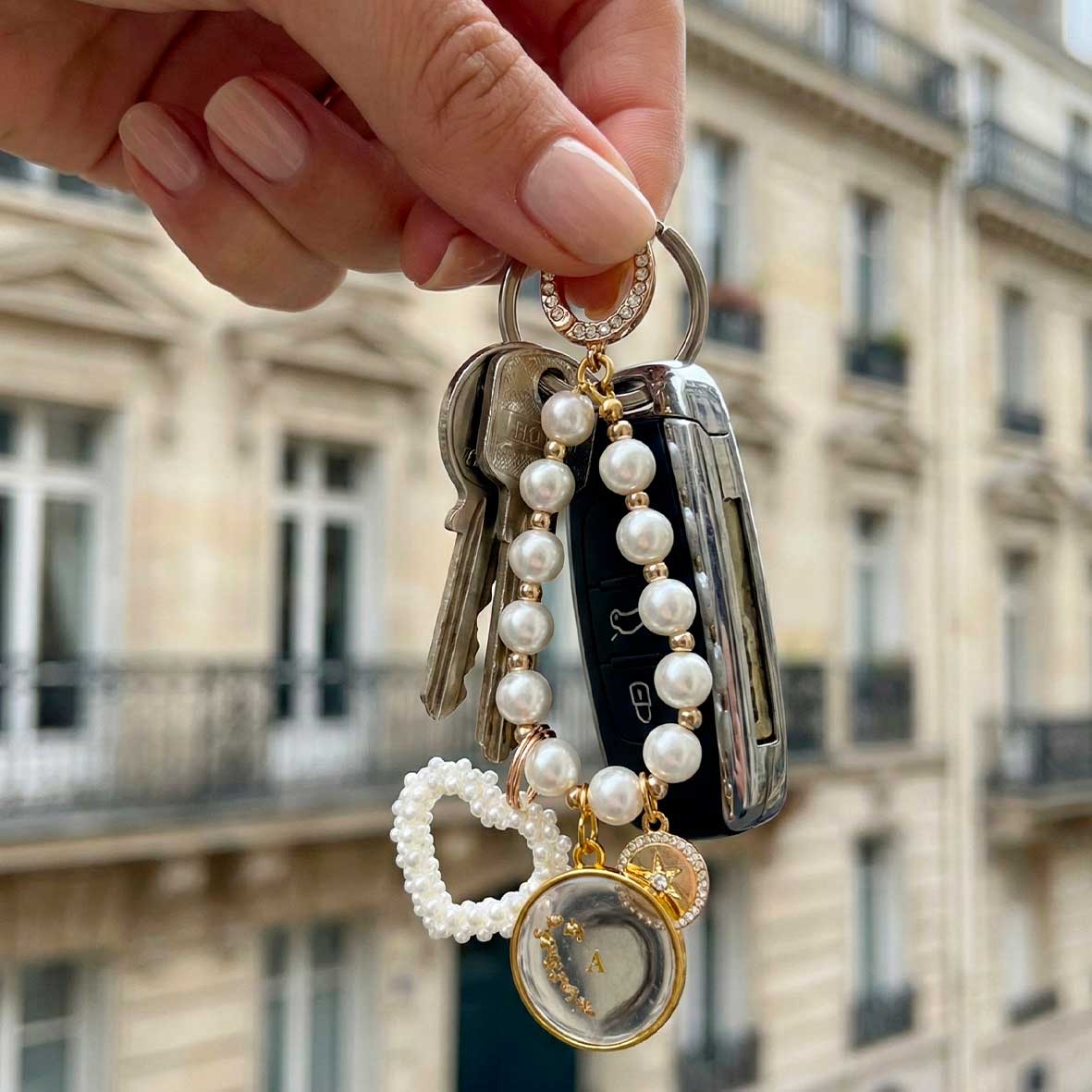 Porte-clés bijou de sac souvenir – Poils d’animal en résine, cœur & feuille d’or